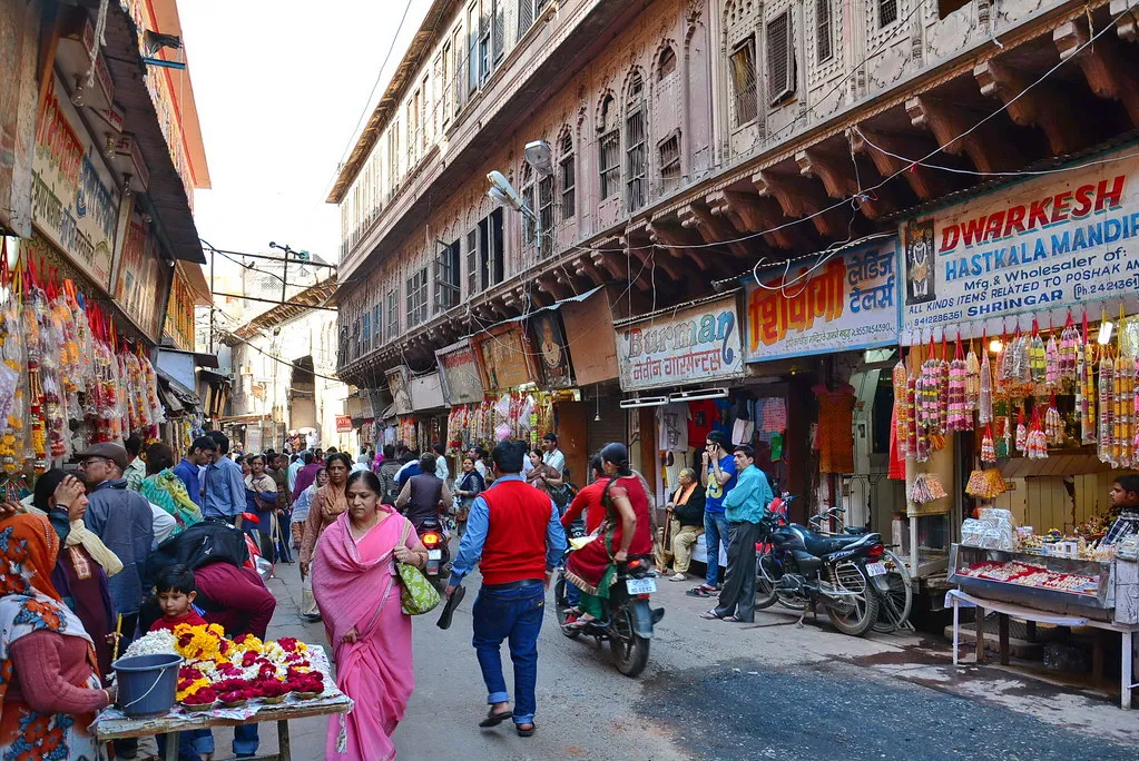 The consumerism of Mathura, pressed against temple walls